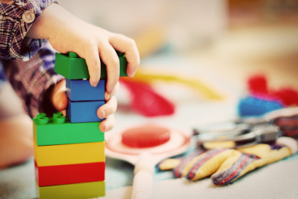 child playing with new donated lego